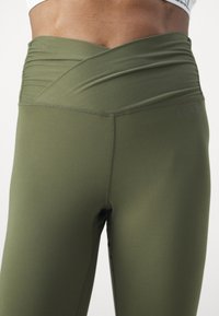 Björn Borg STUDIO CROSS - Leggings - olive night