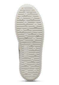 Suola di scarpa in gomma con un motivo testurizzato di cerchi e scanalature, caratterizzata da una base beige e bordi seghettati per una migliore aderenza.