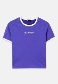 Purple cotton t-shirt with white ribbed neckline and sleeve hems, featuring "The Kooples" logo printed in white on the front.