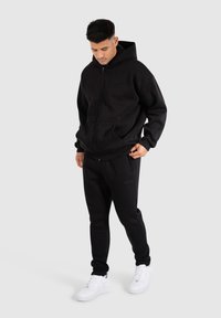 Smilodox CASUAL SPORT VIKTOR - Træningsbukser - schwarz
