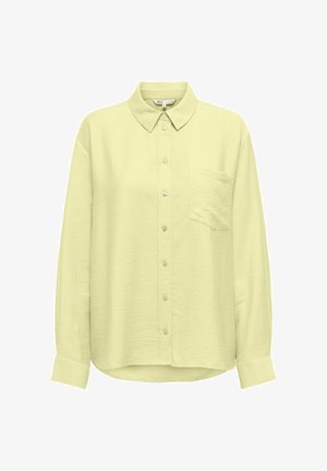 Svijetložuta košulja dugih rukava s ovratnikom, prednjim gumbima i jednim džepom na prsima; blago teksturirana tkanina i zakrivljeni rub.