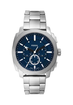 Silberne Metall Fossil-Armbanduhr mit blauem Zifferblatt, drei Unterzifferblättern, strukturierter Lünette und markanten weißen Stundenmarkierungen und Zeigern.
