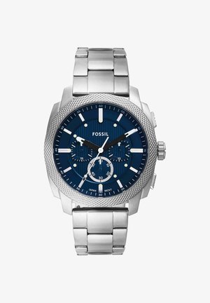 Silberne Metall Fossil-Armbanduhr mit blauem Zifferblatt, drei Unterzifferblättern, strukturierter Lünette und markanten weißen Stundenmarkierungen und Zeigern.