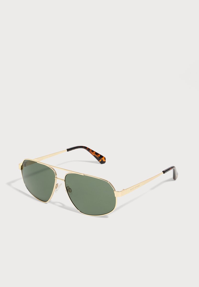 Γυαλιά ηλίου aviator με χρυσό πλαίσιο, σκούρους πράσινους φακούς και ναυτίλους με σχέδιο χελώνας σε λευκό φόντο.