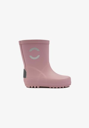 Botte de pluie en caoutchouc rose avec une semelle texturée, un accent de talon gris, et un logo circulaire en argent sur le côté. Surface lisse sans motifs.