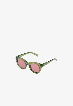 Lunettes de soleil vertes translucides en forme d'œil de chat avec des verres ronds roses et des branches fines inclinées vers l'extérieur.