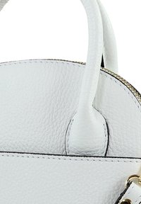 White leather handbag with textured surface, rounded shape, two handles, and gold hardware accents. Features a zip closure and contrasting stitching.