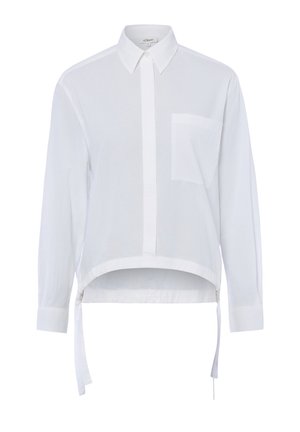 Chemise blanche à manches longues avec col, poche poitrine, patte de boutonnage cachée et ourlet asymétrique avec liens latéraux.