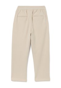 Pantalons de survêtement beiges avec une taille élastique, dotés de deux poches arrière et d'un design à jambe droite. Matériau doux avec une texture lisse.