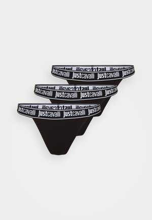 Conjunto de cuecas pretas em renda com três peças. Cada peça tem uma cinta elástica larga com a inscrição "justcavalli" em letras brancas. Textura de tecido suave.