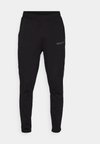 LEGACY TAPERED  - Pantalones deportivos - black