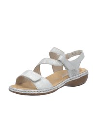 Silver sandal with cross straps, open toe, and cushioned insole. Synthetic upper, stitched detailing, and low wedge heel.