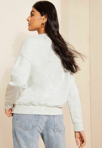 Friends Like These COSY LOGO   - Melegítőfelső - cream