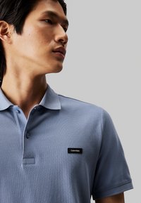 Calvin Klein BUTTON - Poloshirt - troposhere