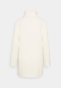 Cremefarbener Strickpullover mit einem hohen Kragen, gerippter Textur und langen Ärmeln, der eine lässige, oversized Passform bietet.