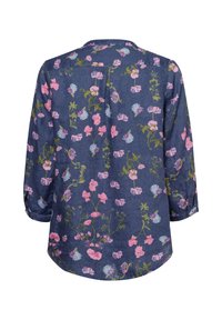 Langärmliges Hemd aus navyblauem Stoff mit Blumenmuster. Verfügt über pinke und grüne Blumen, seitliche Falten und geknöpfte Manschetten.