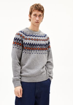 Gray knitted sweater with multicolored geometric patterns in navy, orange, and white. Features a ribbed collar and cuffs.