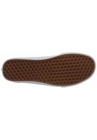 Suela de zapatilla blanca con un fondo de goma marrón texturizado que presenta un patrón de diamantes para mayor agarre. Bordes redondeados y suaves.