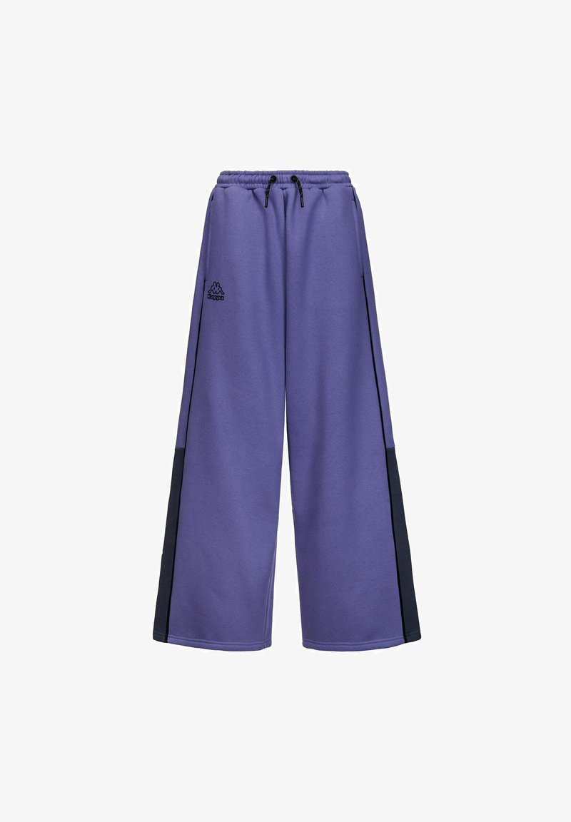 Pantaloni della tuta viola con elastico in vita, coulisse e pannelli laterali neri. Materiale morbido con un design largo e ampio. Logo Kappa sul davanti.