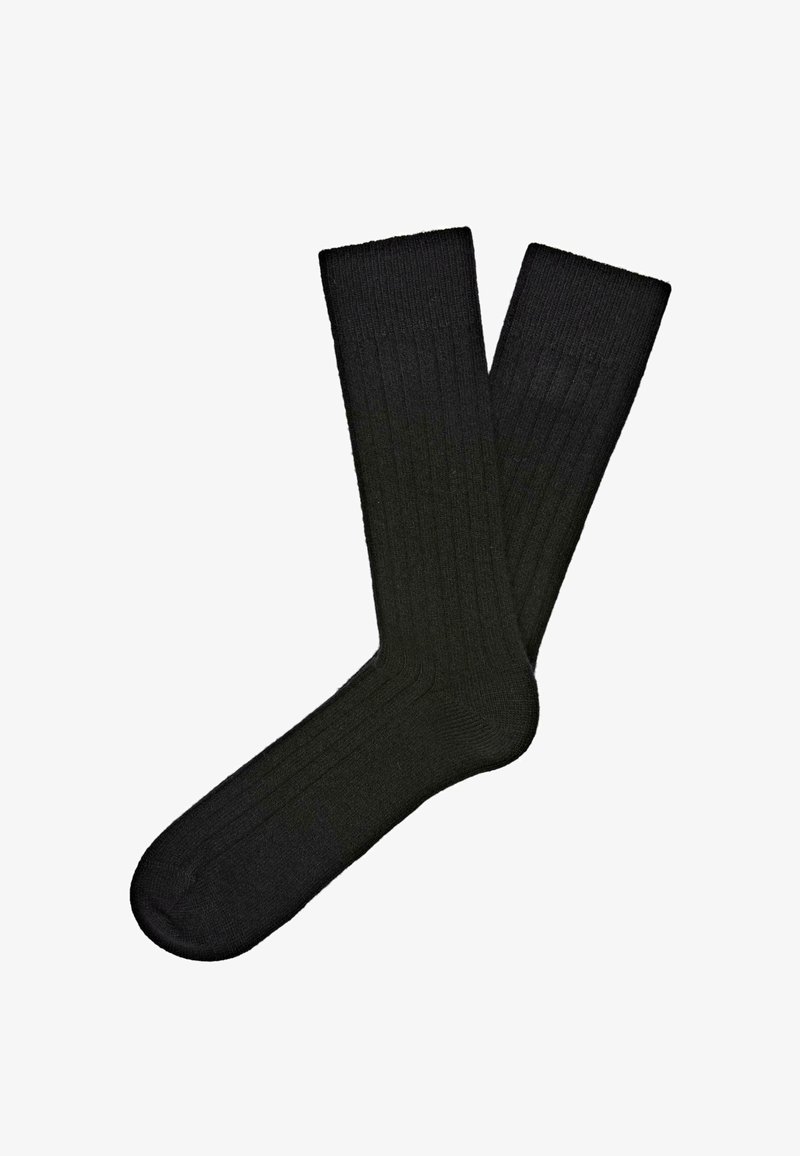 Zwarte geribde sokken van textiel, voorzien van een middellange schacht tot halverwege de kuit en een versterkte teen voor extra duurzaamheid. Eenvoudig, klassiek ontwerp.