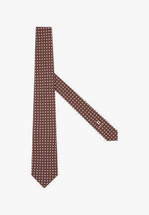 Cravatta marrone con un motivo geometrico bianco, realizzata in tessuto. Leggero lucido, con punta appuntita e un'etichetta con il marchio vicino all'estremità stretta.