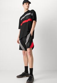 HUGO DISHORT - Träningsbyxor - black