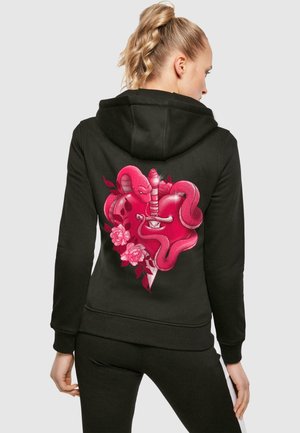 Black hoodie featuring a large pink heart graphic with a snake, sword, and floral accents on the back. Soft fabric, relaxed fit, ribbed cuffs.