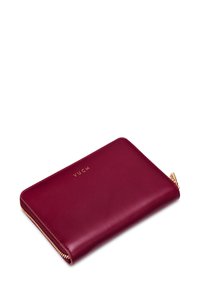 Burgundy leather wallet with a gold zip closure and embossed brand logo. Smooth texture and rectangular shape with minimal design.