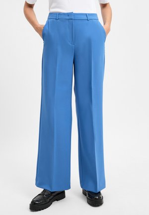 Blue wide-legged pants made of smooth fabric, featuring a tailored design, with side pockets and a relaxed fit. Accented by a sleek waistband.