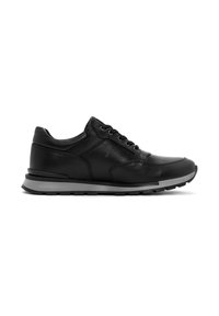 Sneaker in pelle nera con punta rotonda, sei asole, collo imbottito e suola in gomma grigia. Presenta una finitura liscia e un design sobrio.