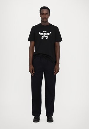 TROUSERS UNISEX - Trousers - black