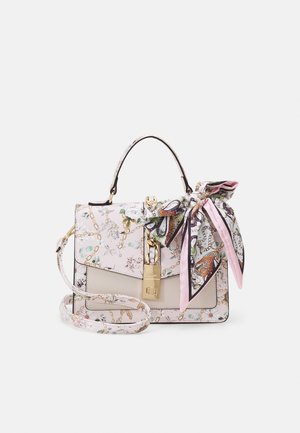 Floral-patterned handbag in pink and cream, featuring a gold clasp, chain accents, and a detachable scarf tied at the handle.