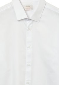 Weißes Slim-Fit-Hemd aus strukturiertem Stoff, mit Kragen, Knopfleiste und fünf Knöpfen in der Mitte. Das Etikett trägt die Aufschrift "CALLIOPE L."