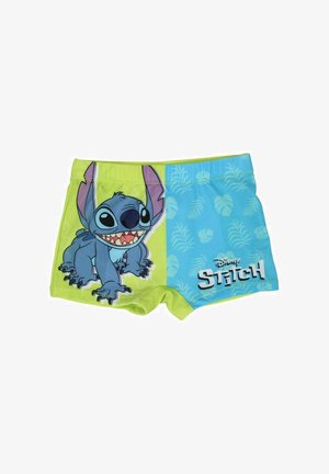 Maillots de bain pour enfants divisés en vert et bleu, avec un grand personnage de Stitch en dessin animé et des motifs de feuilles tropicales accompagnés du texte "Disney Stitch".