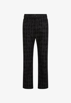 Pantaloni neri con un motivo astratto testurizzato. Design a gamba dritta, dotati di passanti per cintura e tasche anteriori. Tessuto elasticizzato.