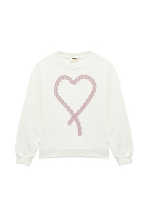 Sweatshirt blanc avec un design en dentelle rose en forme de cœur. Il présente un col rond et des manches longues avec des poignets ajustés. Texture douce et coupe décontractée.