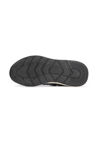 Schwarze Gummisohle für Sneakers mit texturiertem Grip, geometrischem Profil und beige abgesetzter Kante. Runde Form mit detailspezifischem Fokus auf Langlebigkeit.