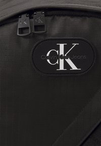 Calvin Klein Jeans METAFORMS ROUNDED - Zaino - black