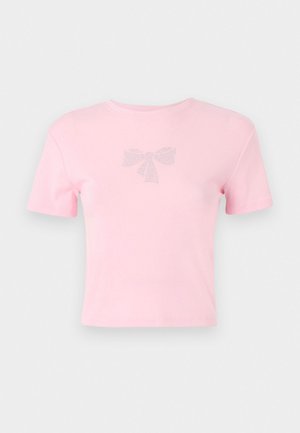 Lühikeste varrukatega roosa puuvillane T-särk, mille esiosal on sädelusega kaunistatud lipsu muster. Ümar kaelus, mugav lõige.