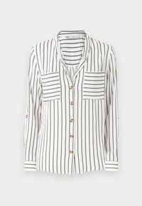 Chemise blanche à manches longues avec boutons, rayures verticales noires, deux poches poitrine à rayures horizontales et col.