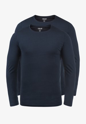 Dwie koszule z długim rękawem w ciemnym granacie, wykonane z miękkiego materiału bawełnianego. Każda z nich ma okrągły dekolt i prosty, nieozdobiony design.