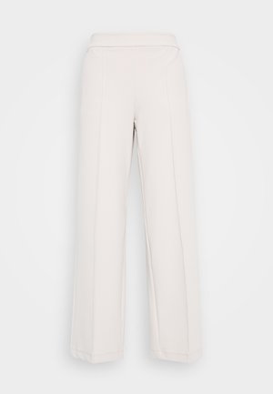 Light beige wide-leg pants made of soft fabric, featuring a smooth waistband and visible seam detailing along the front.