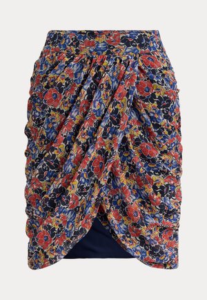 Φούστα με λουλουδάτο σχέδιο σε σκούρο μπλε φόντο με κόκκινα και μπλε λουλούδια, με ραμμένα πιέτες και ελαστική μέση. Μαλακό, ελαφρύ ύφασμα.
