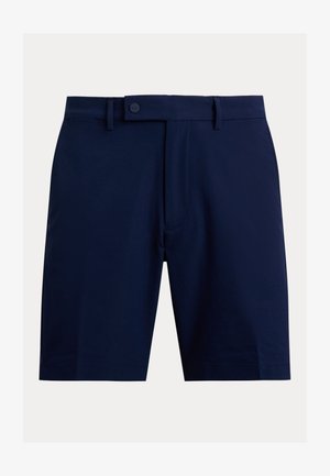 Shorts bleu marine en tissu lisse, avec fermeture à bouton, devant plat et poches latérales. Coupe ajustée avec jambes droites.