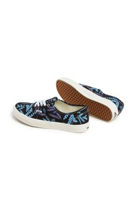 Canvas low-top sneakers with a colorful fern pattern in blue and purple on a black background. White laces and a gum rubber sole.