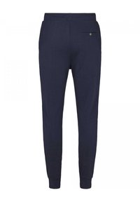 Marineblauwe sweatpants van zacht materiaal, met een elastische taille met trekkoord, taps toelopende benen en een achterzak met een knoopdetail.
