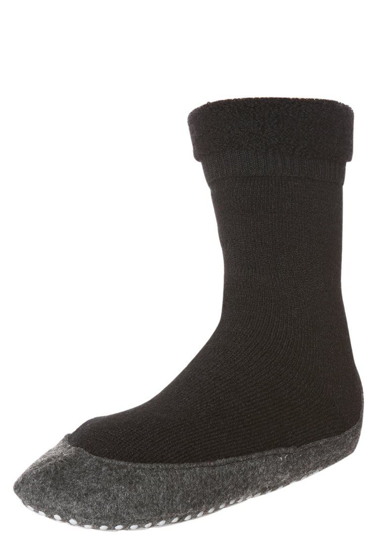Schwarze Thermosocke mit geripptem oberen Rand, glattem Strickkörper und grauem Filzsohle, ausgestattet mit weißen rutschfesten Punktakzenten.