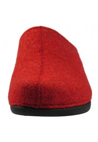 Red felt slipper with a rounded toe, seamless design, and black rubber sole. The texture is soft and slightly fuzzy, indicating warmth.