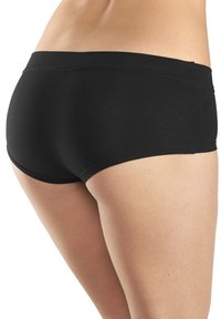 Shorts noirs en coton stretch avec une taille basse, présentant des coutures lisses et une finition sans couture pour plus de confort et un meilleur ajustement.