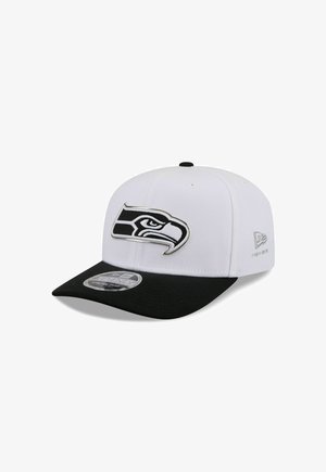 White and black snapback cap featuring a stylized bird head logo on the front and a New Era logo on the side.